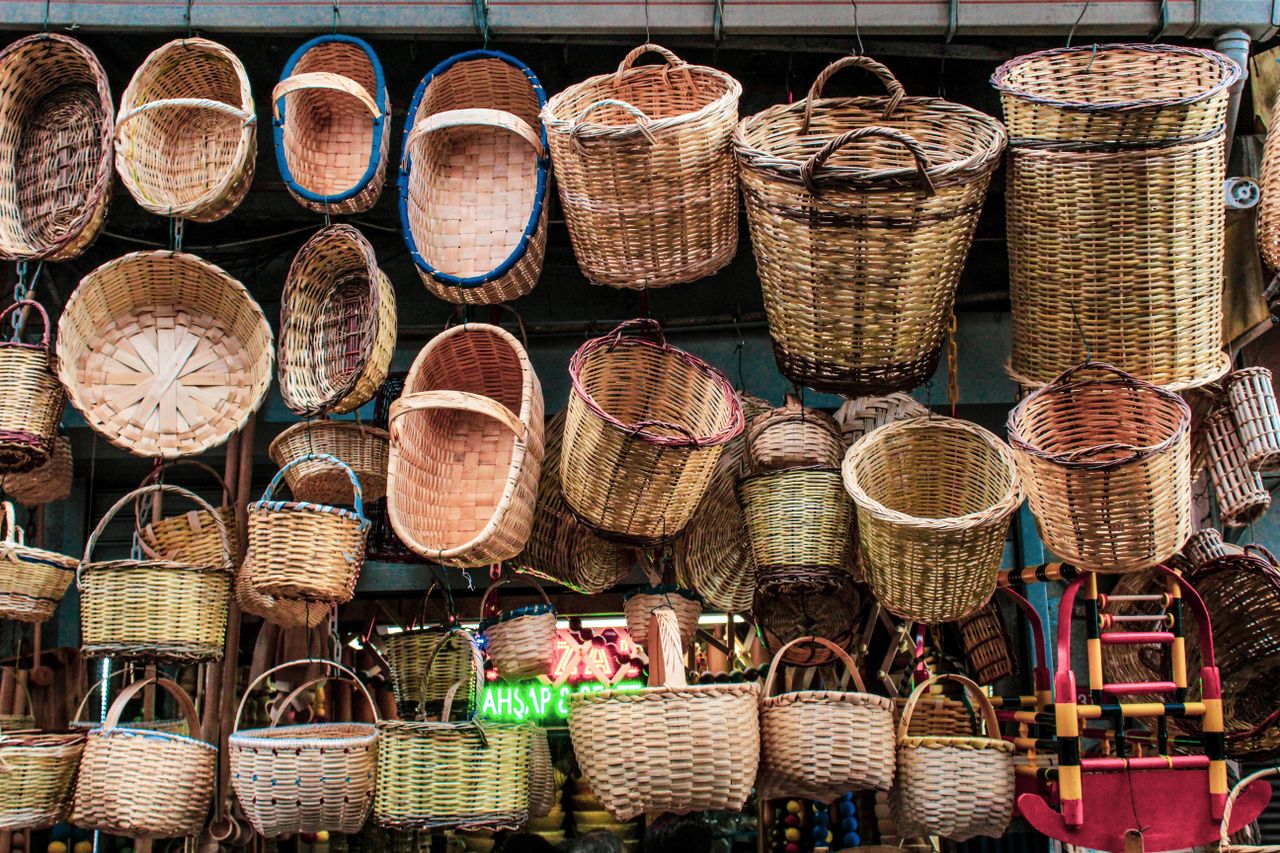 Sample stock photo of woven baskets at a market, not confirmed Nelson & Associates stock